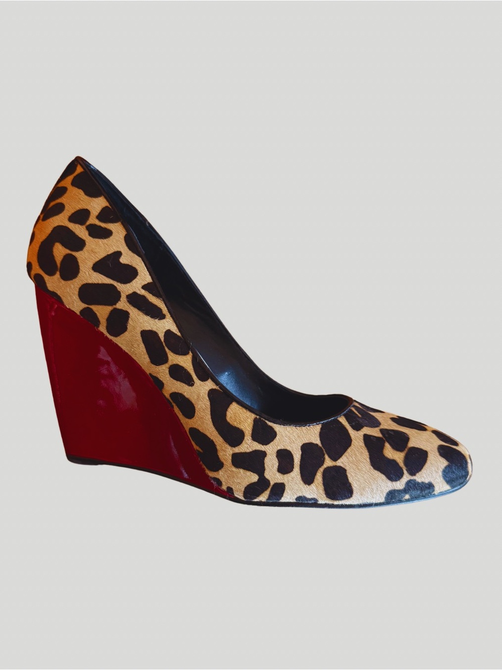 Leopard Print Calf Hair Wedge Pump with Red Heel